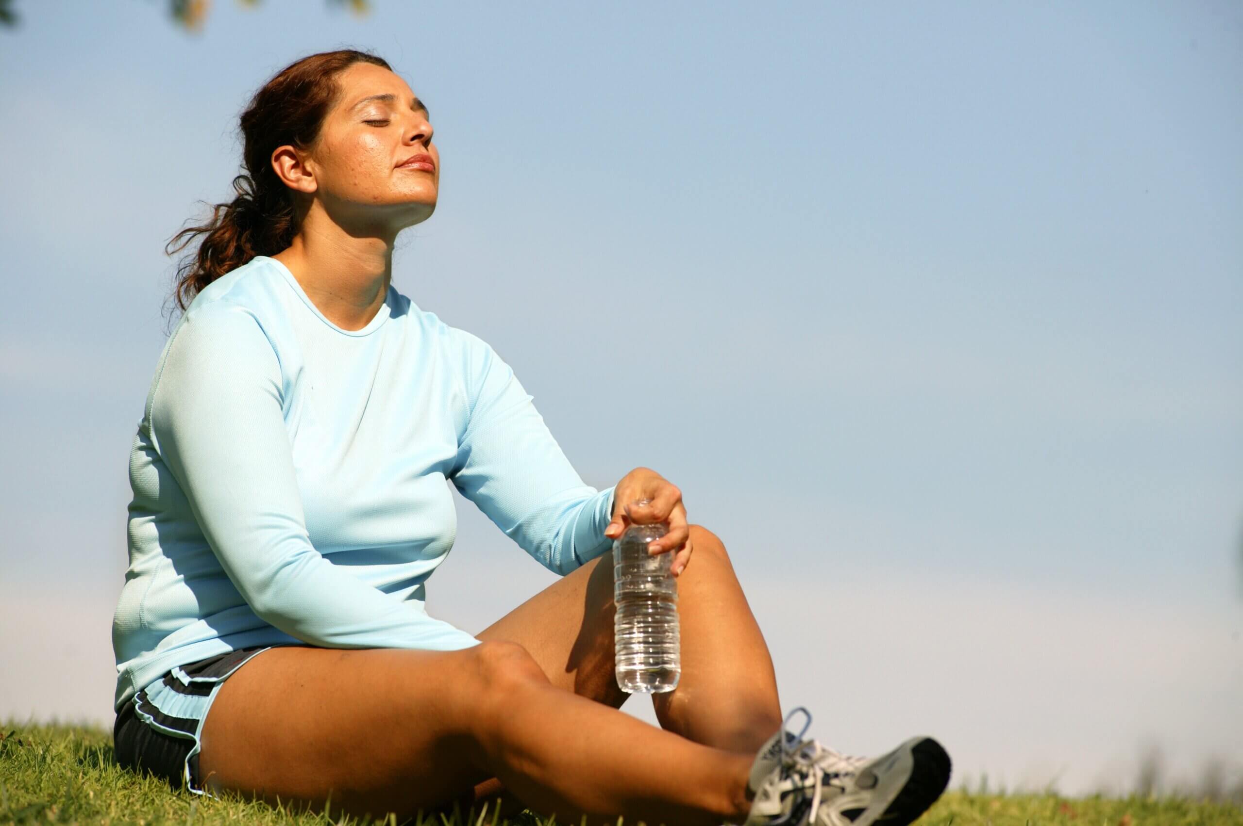 Person doing yoga in the park