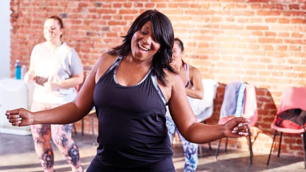 Woman dancing in fitness class