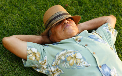 man sleeping in grass